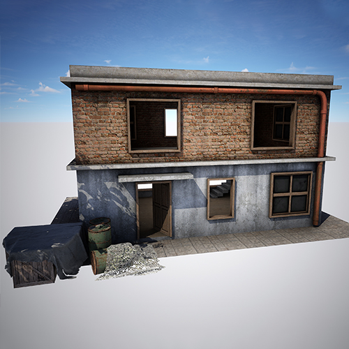 Casa de tijolos abandonada de dois andares